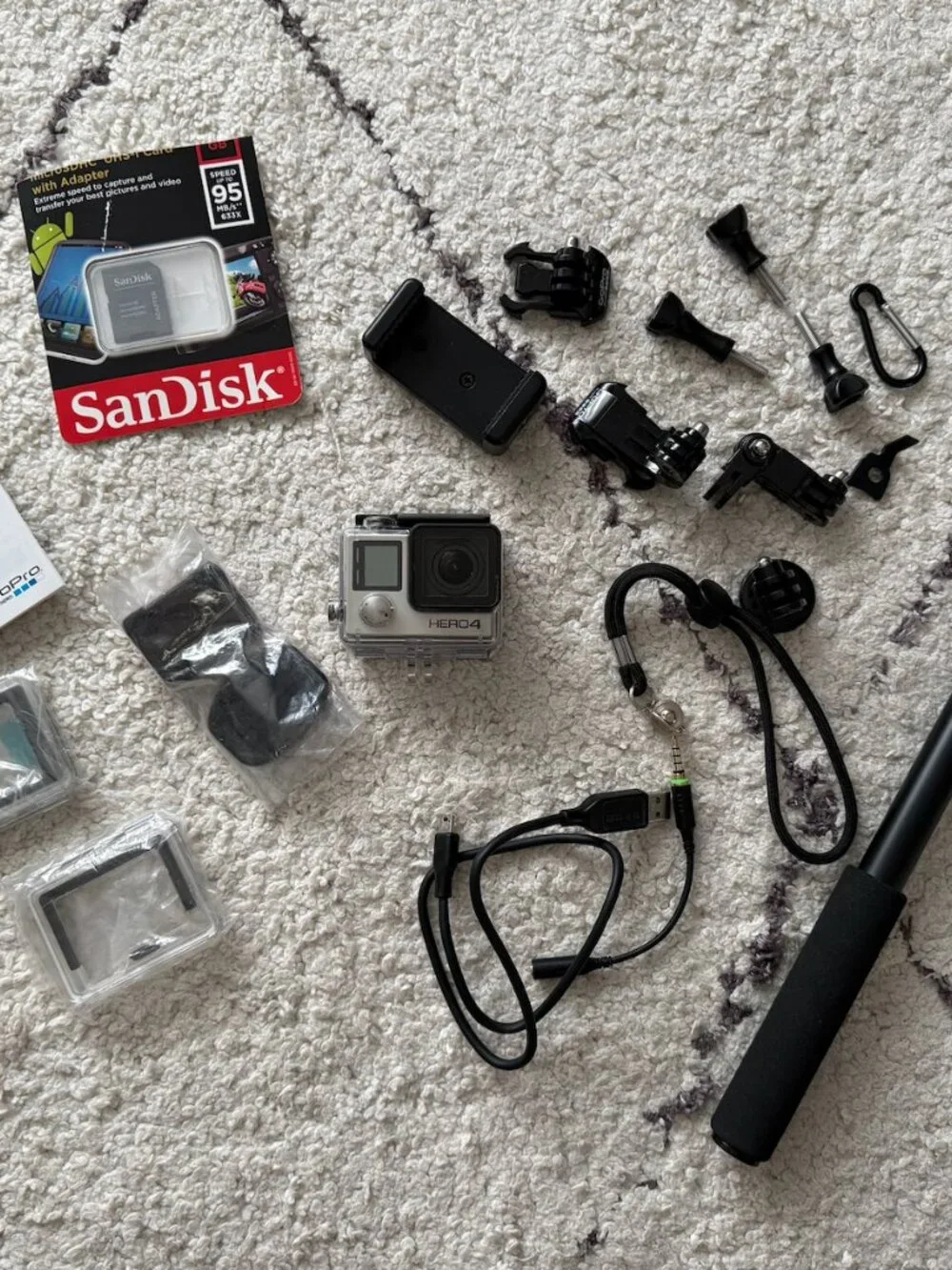 Brand New Go Pro Hero 4 silver waterproof - with selfie stick, 32GB card